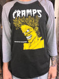 The Cramps Bad Music for Bad People heathered black raglan t-shirt with heathered grey 3/4 sleeves featuring album artwork, on a model.