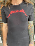 Metallica Kill 'Em All Classic Logo black t-shirt featuring the classic logo in red across the chest, on a model.
