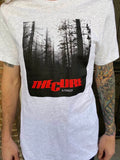 The Cure A Forest light heather grey t-shirt featuring artwork from the single along with the band logo in red, on a model.